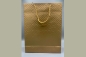 Preview: Geschenktüte Tasche gold mit Prägung groß